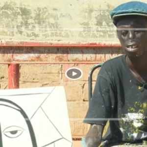 Brûlé par la vie, illuminé par l'art : Guem Guem, un survivant qui peint l'espoir